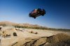 141_0912_05_z+red_bull_new_year_no_limits_rally_car_jump+travis_pastrana.jpg